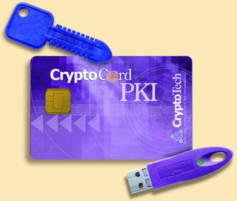 Na zdjęciu karta chipowa, token USB przypominający pen-drive i kluczyk plastikowy